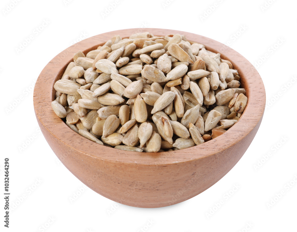 Peeled sunflower seeds in wooden bowl isolated on white Peeled sunflower seeds in wooden bowl isolated on white