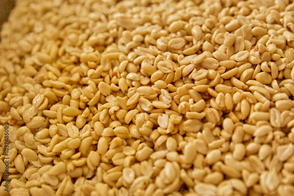 Processing and roasting of peanuts on an industrial scale. Industrial food production. Processing and roasting of peanuts on an industrial scale. Industrial food production.