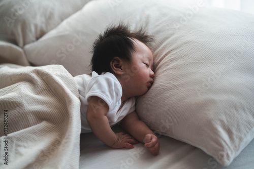 Peaceful Baby Sleeping on Pillow in Soft Morning Light