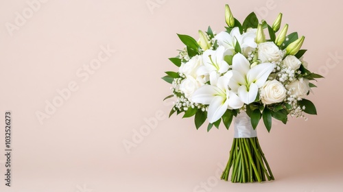 Elegant white floral bouquet with lilies and roses photo