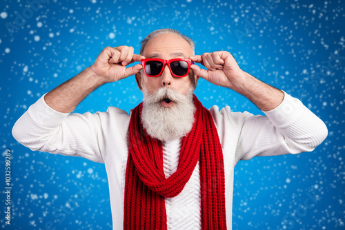 Photo of funny impressed mature man dressed white pullover arms red glasses open mouth isolated blue color background