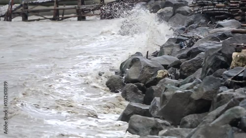 waves that wash over the shore photo