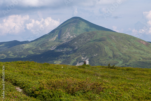 Carpathians, Chornohora ridge, Hoverla mountain (2061 m), pillar - border of World War I. Image of attractive. Vibrant photo wallpaper. Tourism in the Carpathians. photo