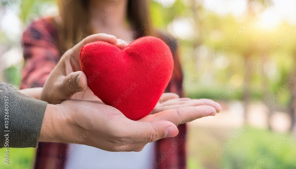 Woman Giving Heart On Man's Hand Woman Giving Heart On Man's Hand