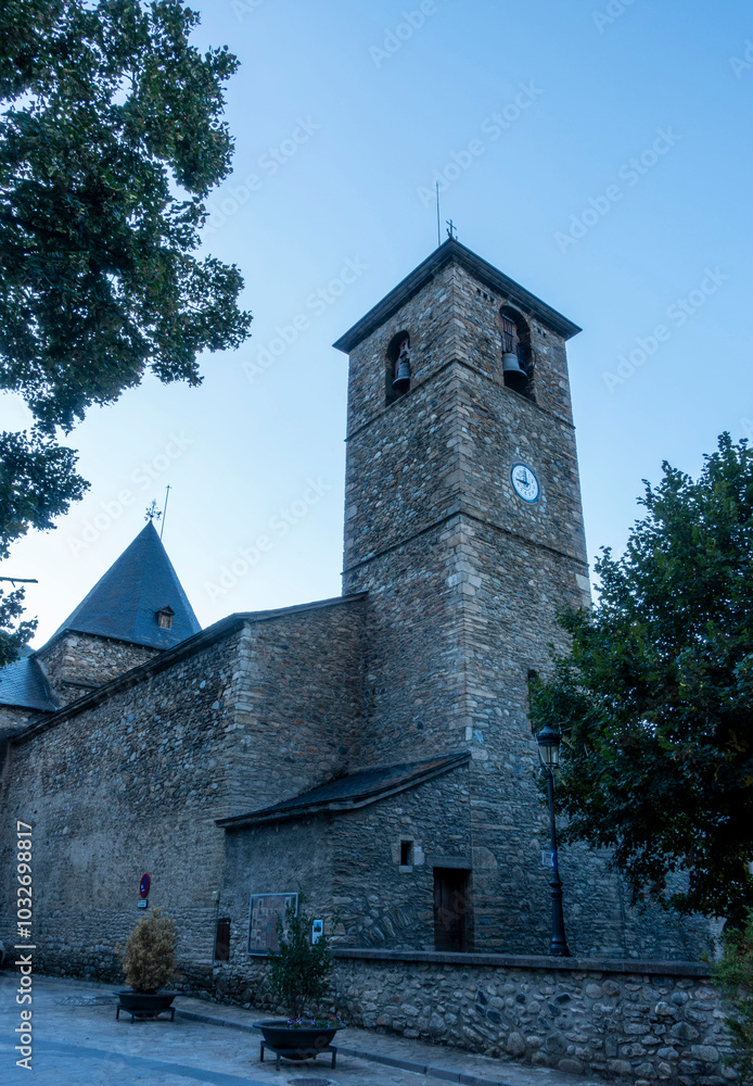 Fototapeta premium Bell tower of the church of Santa Maria la Mayor in Benasque. Huesca, Aragon, Spain.