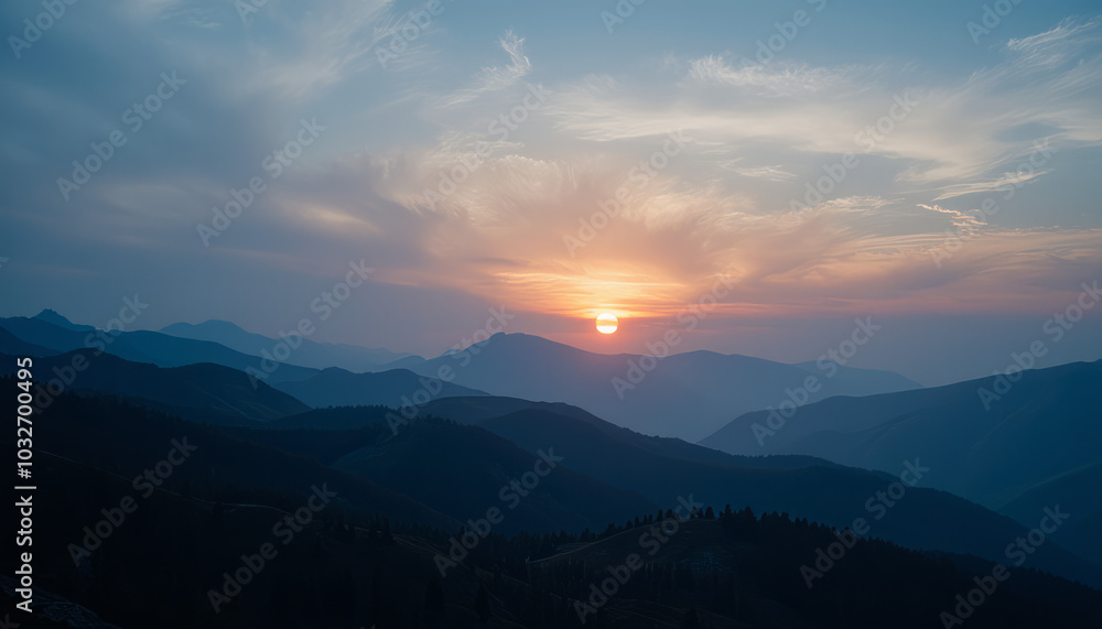 Obraz premium Serene Mountain Landscape at Sunrise, Illuminating Rolling Hills and Valleys