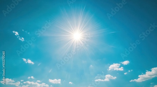 Shining sun at clear blue sky with copy space photo