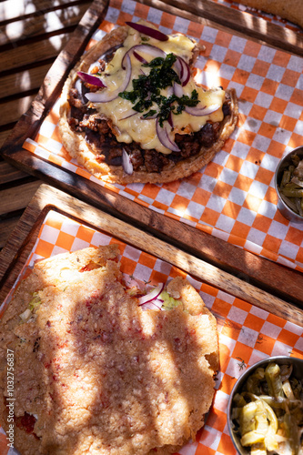 Obraz na płótnie Traditional typical Mexican food, Mexican gastronomy concept. Tacos, chilaquiles, Mexican tradition. w salonie