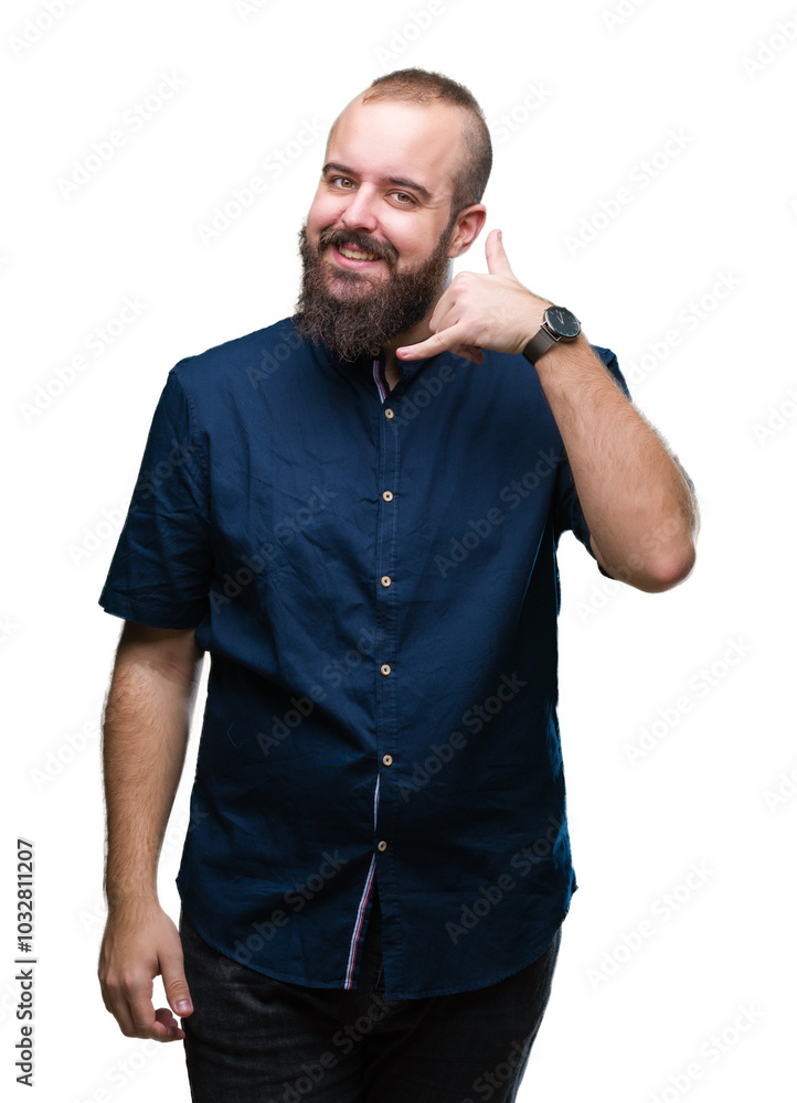 Young caucasian hipster man over isolated background smiling doing phone gesture with hand and fingers like talking on the telephone. Communicating concepts. Young caucasian hipster man over isolated background smiling doing phone gesture with hand and fingers like talking on the telephone. Communicating concepts.