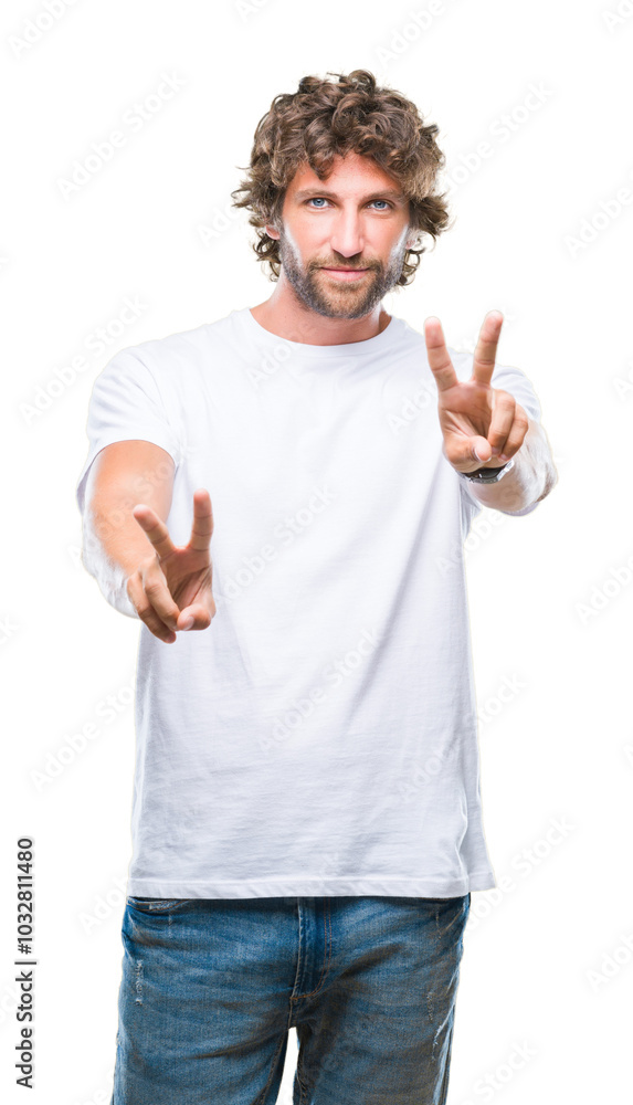 Handsome hispanic model man over isolated background smiling looking to the camera showing fingers doing victory sign. Number two. Handsome hispanic model man over isolated background smiling looking to the camera showing fingers doing victory sign. Number two.