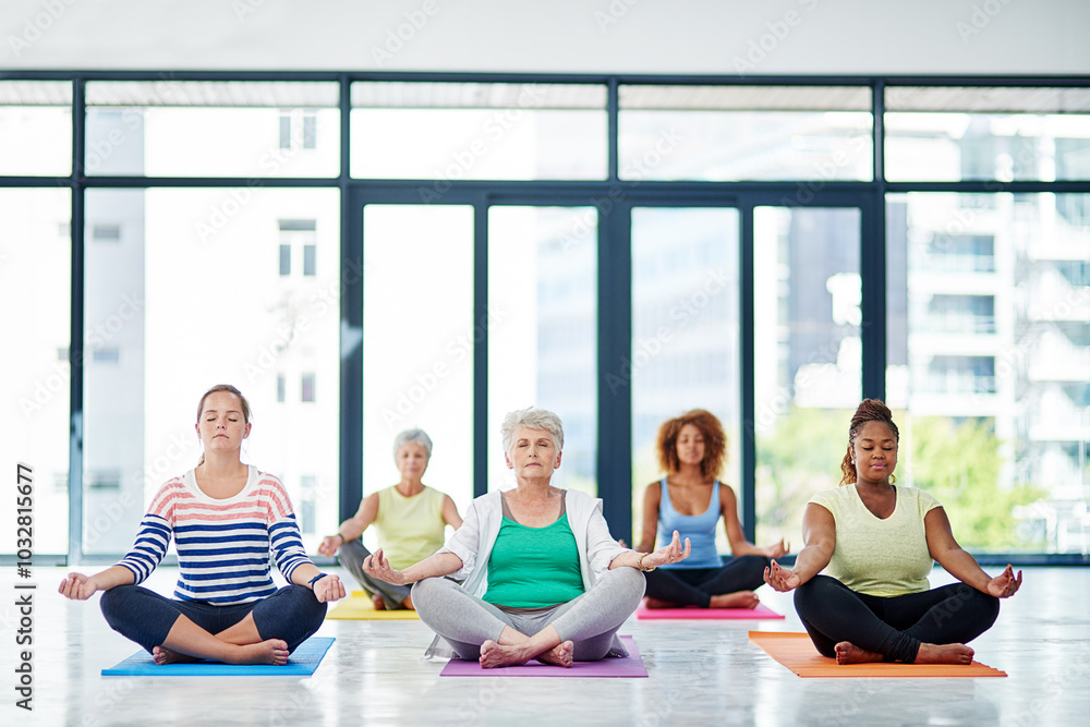 Yoga, meditation and women in class on floor for wellness, healthy mindset and balance in studio. Retirement, friends and mature people for exercise, breathe and pilates for mindfulness, zen and calm Yoga, meditation and women in class on floor for wellness, healthy mindset and balance in studio. Retirement, friends and mature people for exercise, breathe and pilates for mindfulness, zen and calm