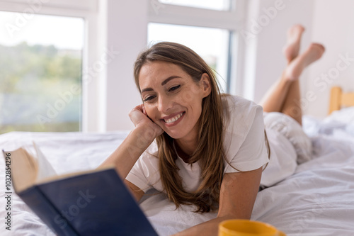 Girl laying in bed and reading book Free Download Girl laying in bed and reading book - GFXLoad