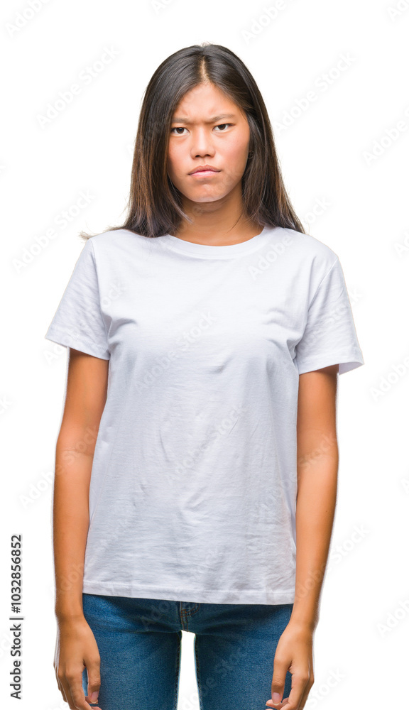 Young asian woman over isolated background skeptic and nervous, frowning upset because of problem. Negative person. Young asian woman over isolated background skeptic and nervous, frowning upset because of problem. Negative person.