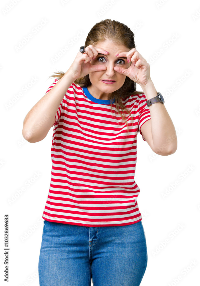 Middle age mature woman wearing casual t-shirt over isolated background Trying to open eyes with fingers, sleepy and tired for morning fatigue Middle age mature woman wearing casual t-shirt over isolated background Trying to open eyes with fingers, sleepy and tired for morning fatigue