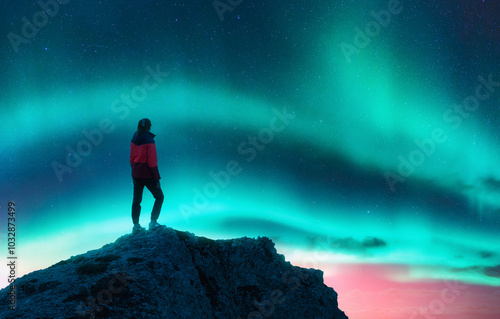 Northern lights and woman o...