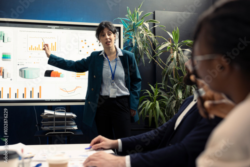 Fotografie Business manager trying to eliminate risks of unforeseen events and disruptions, discussing supply chain resilience and contingency plans