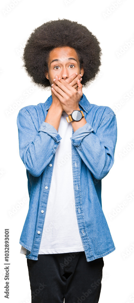 Young african american man with afro hair shocked covering mouth with hands for mistake. Secret concept. Young african american man with afro hair shocked covering mouth with hands for mistake. Secret concept.