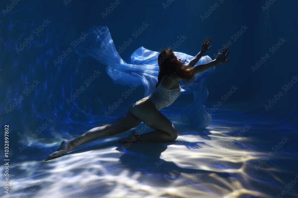 custom made wallpaper toronto digitalYoung sporty woman in white bikini holding blue cloth underwater in the pool