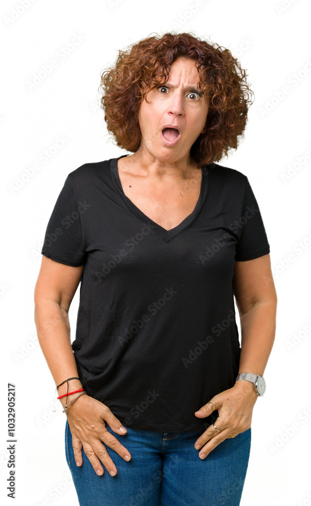 Beautiful middle ager senior woman over isolated background In shock face, looking skeptical and sarcastic, surprised with open mouth Beautiful middle ager senior woman over isolated background In shock face, looking skeptical and sarcastic, surprised with open mouth