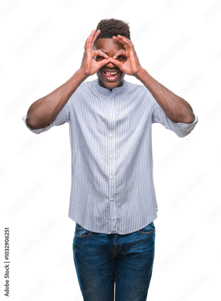 Young african american man over isolated background doing ok gesture like binoculars sticking tongue out, eyes looking through fingers. Crazy expression. Young african american man over isolated background doing ok gesture like binoculars sticking tongue out, eyes looking through fingers. Crazy expression.
