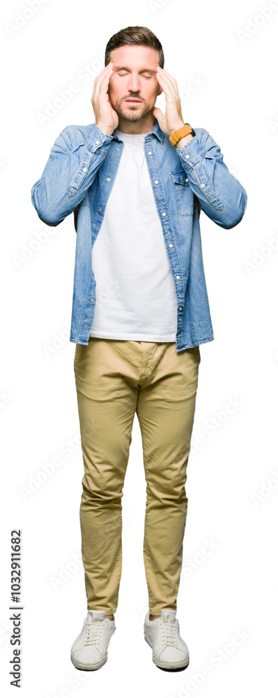 Handsome man with blue eyes and beard wearing denim jacket with hand on head for pain in head because stress. Suffering migraine. Handsome man with blue eyes and beard wearing denim jacket with hand on head for pain in head because stress. Suffering migraine.