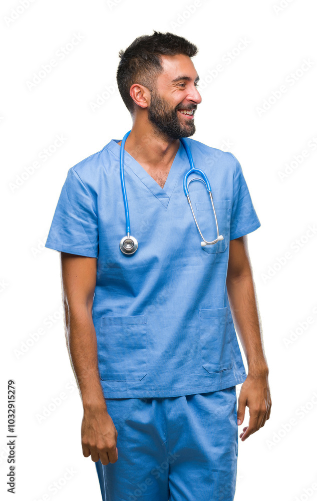 Adult hispanic doctor or surgeon man over isolated background looking away to side with smile on face, natural expression. Laughing confident. Adult hispanic doctor or surgeon man over isolated background looking away to side with smile on face, natural expression. Laughing confident.