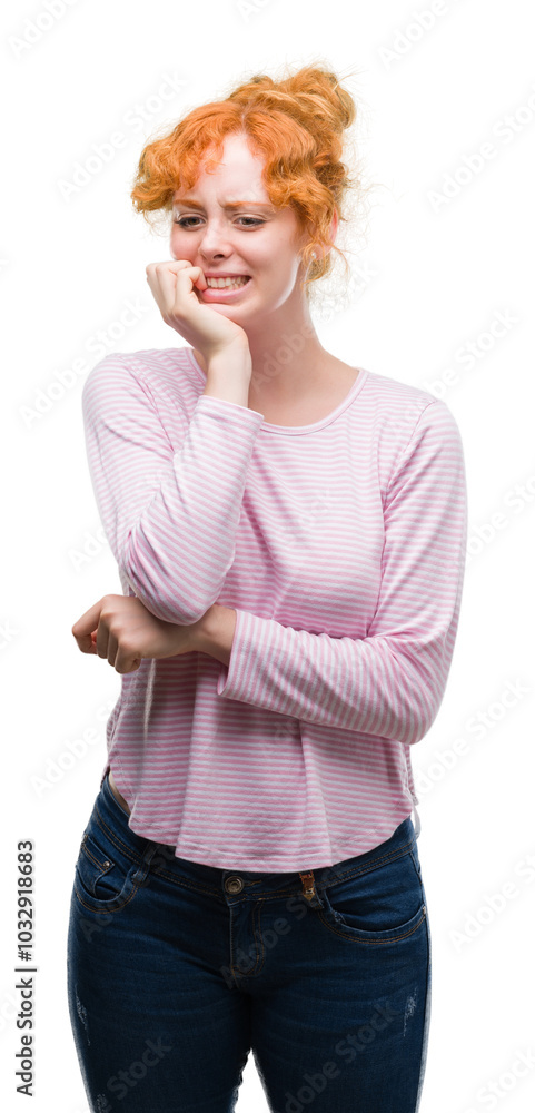 Young redhead woman looking stressed and nervous with hands on mouth biting nails. Anxiety problem. Young redhead woman looking stressed and nervous with hands on mouth biting nails. Anxiety problem.