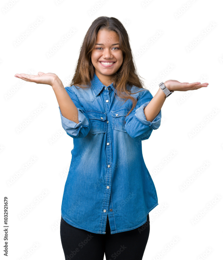 Young beautiful brunette woman wearing blue denim shirt over isolated background Smiling showing both hands open palms, presenting and advertising comparison and balance Young beautiful brunette woman wearing blue denim shirt over isolated background Smiling showing both hands open palms, presenting and advertising comparison and balance