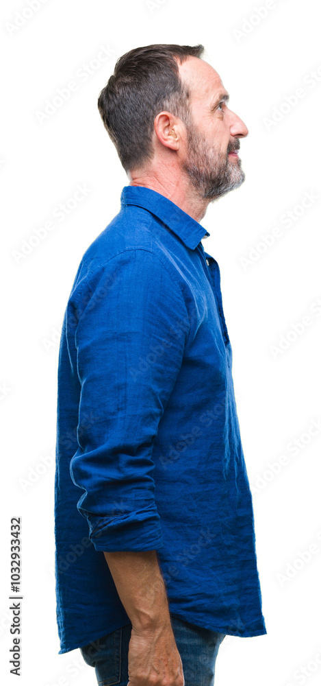 Middle age hoary senior man over isolated background looking to side, relax profile pose with natural face with confident smile. Middle age hoary senior man over isolated background looking to side, relax profile pose with natural face with confident smile.