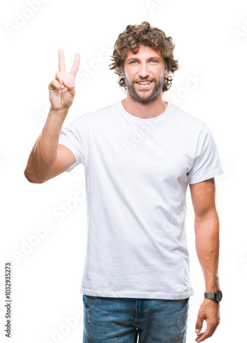 Handsome hispanic model man over isolated background showing and pointing up with fingers number two while smiling confident and happy.