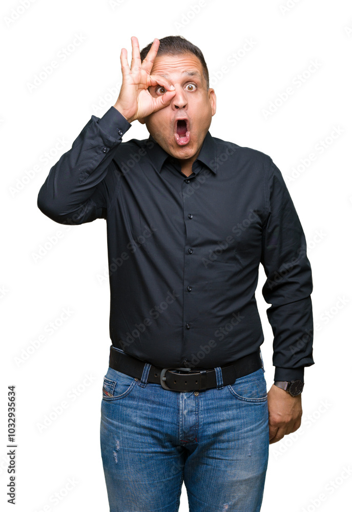 Handsome middle age arab business man over isolated background doing ok gesture shocked with surprised face, eye looking through fingers. Unbelieving expression. Handsome middle age arab business man over isolated background doing ok gesture shocked with surprised face, eye looking through fingers. Unbelieving expression.