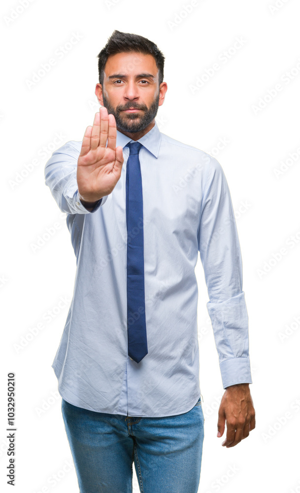 Adult hispanic business man over isolated background doing stop sing with palm of the hand. Warning expression with negative and serious gesture on the face. Adult hispanic business man over isolated background doing stop sing with palm of the hand. Warning expression with negative and serious gesture on the face.
