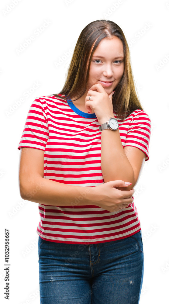 Young caucasian beautiful woman over isolated background looking confident at the camera with smile with crossed arms and hand raised on chin. Thinking positive. Young caucasian beautiful woman over isolated background looking confident at the camera with smile with crossed arms and hand raised on chin. Thinking positive.