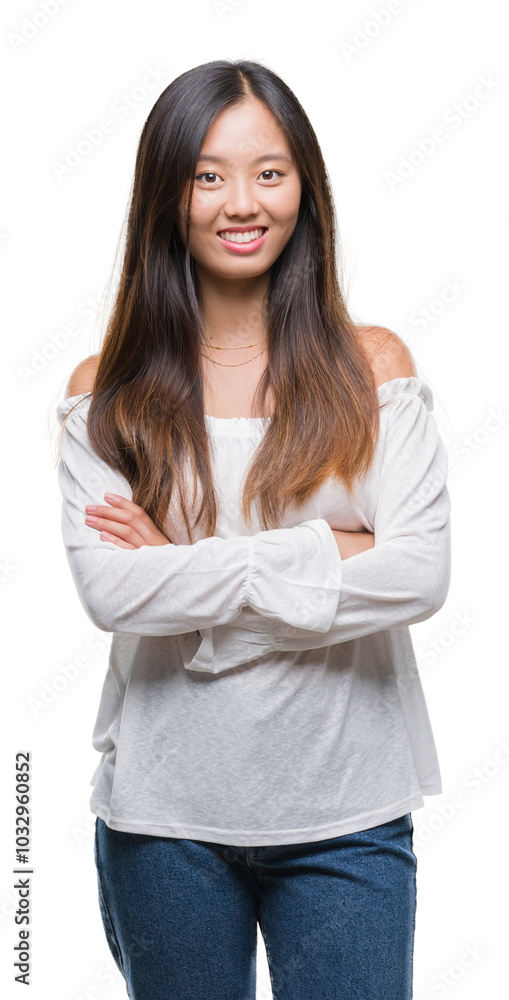Young asian woman over isolated background happy face smiling with crossed arms looking at the camera. Positive person. Young asian woman over isolated background happy face smiling with crossed arms looking at the camera. Positive person.