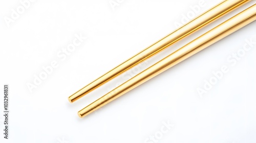 Gold Chopsticks isolated on white background. 