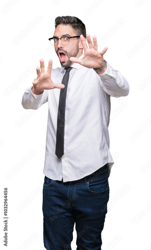 Young handsome business man wearing glasses over isolated background afraid and terrified with fear expression stop gesture with hands, shouting in shock. Panic concept. Young handsome business man wearing glasses over isolated background afraid and terrified with fear expression stop gesture with hands, shouting in shock. Panic concept.
