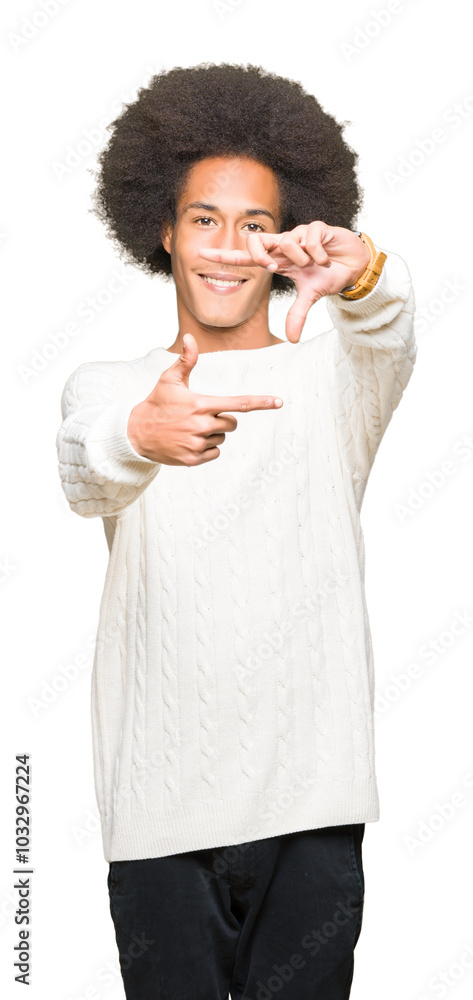 Young african american man with afro hair wearing winter sweater smiling making frame with hands and fingers with happy face. Creativity and photography concept. Young african american man with afro hair wearing winter sweater smiling making frame with hands and fingers with happy face. Creativity and photography concept.