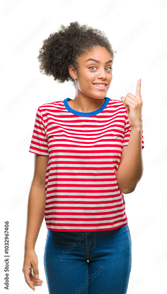 Young afro american woman over isolated background pointing finger up with successful idea. Exited and happy. Number one. Young afro american woman over isolated background pointing finger up with successful idea. Exited and happy. Number one.