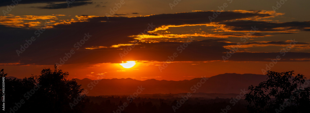 Banner purple sky sunrise dramatic beautiful landscape view. Dawn sky violet pink gold dusk time cloudscape with sunlight. Panorama Dramatic vibrant sunset scenic landscape nature with copy space Banner purple sky sunrise dramatic beautiful landscape view. Dawn sky violet pink gold dusk time cloudscape with sunlight. Panorama Dramatic vibrant sunset scenic landscape nature with copy space