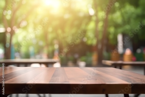 Empty wood table and Coffee shop blur background with bokeh image.