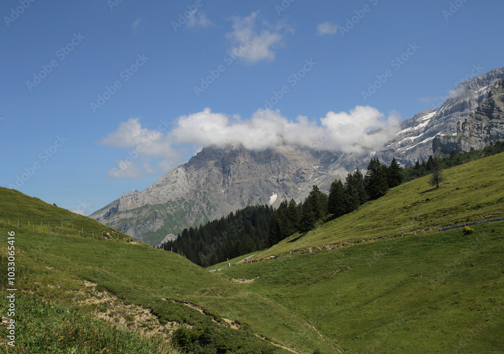 View Of A Mountain Peak And Clouds View Of A Mountain Peak And Clouds