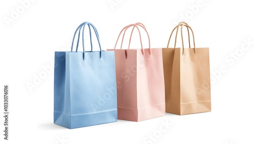 Shopping bags, one blue and pink with a white background, one beige brown bag on the right side, isolated, white background,