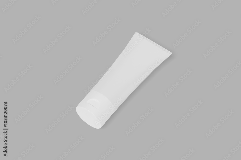 Plastic cosmetic tube for cream or gel mockup isolated on gray background Plastic cosmetic tube for cream or gel mockup isolated on gray background