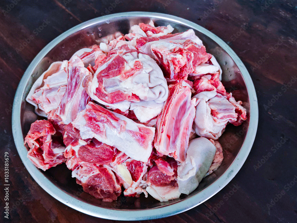Lamb ribs in stainless steel bowl Lamb ribs in stainless steel bowl