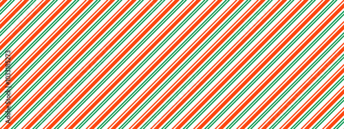 Christmas seamless pattern. Red green diagonal dotted stripe background. Candy cane repeating decoration wallpaper. Winter holiday gift backdrop. Christmas peppermint present wrapping paper. Vector