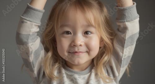 MinJi - Joyful Young Girl in White Sweater with Arms Raised, Expressing Pure Childhood Happiness and Freedom