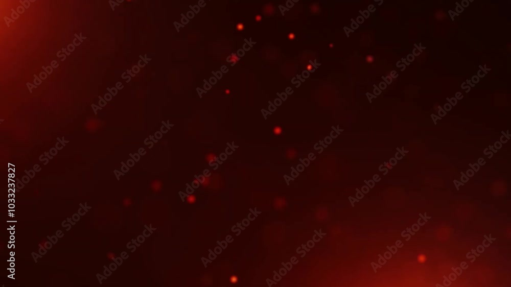 Abstract red bokeh background with small out-of-focus particles in a dark setting.