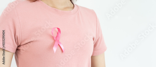 Wallpaper Mural Woman and pink ribbon breast cancer awareness. Female health check consciousness. international Women Day and World Cancer Day. sign cancer, Symbolic, health care, support patients, timely diagnosis Torontodigital.ca