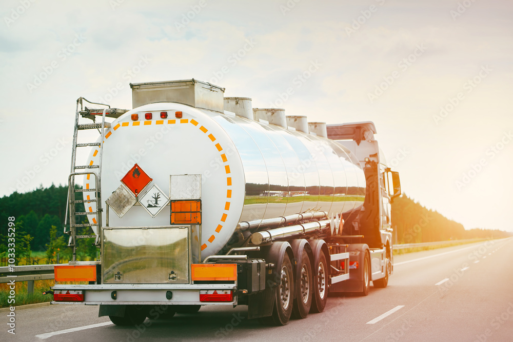 Truck carrying flammable liquids driving on highway