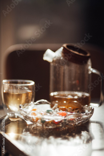 A kettle of herbal tea is on the table. 